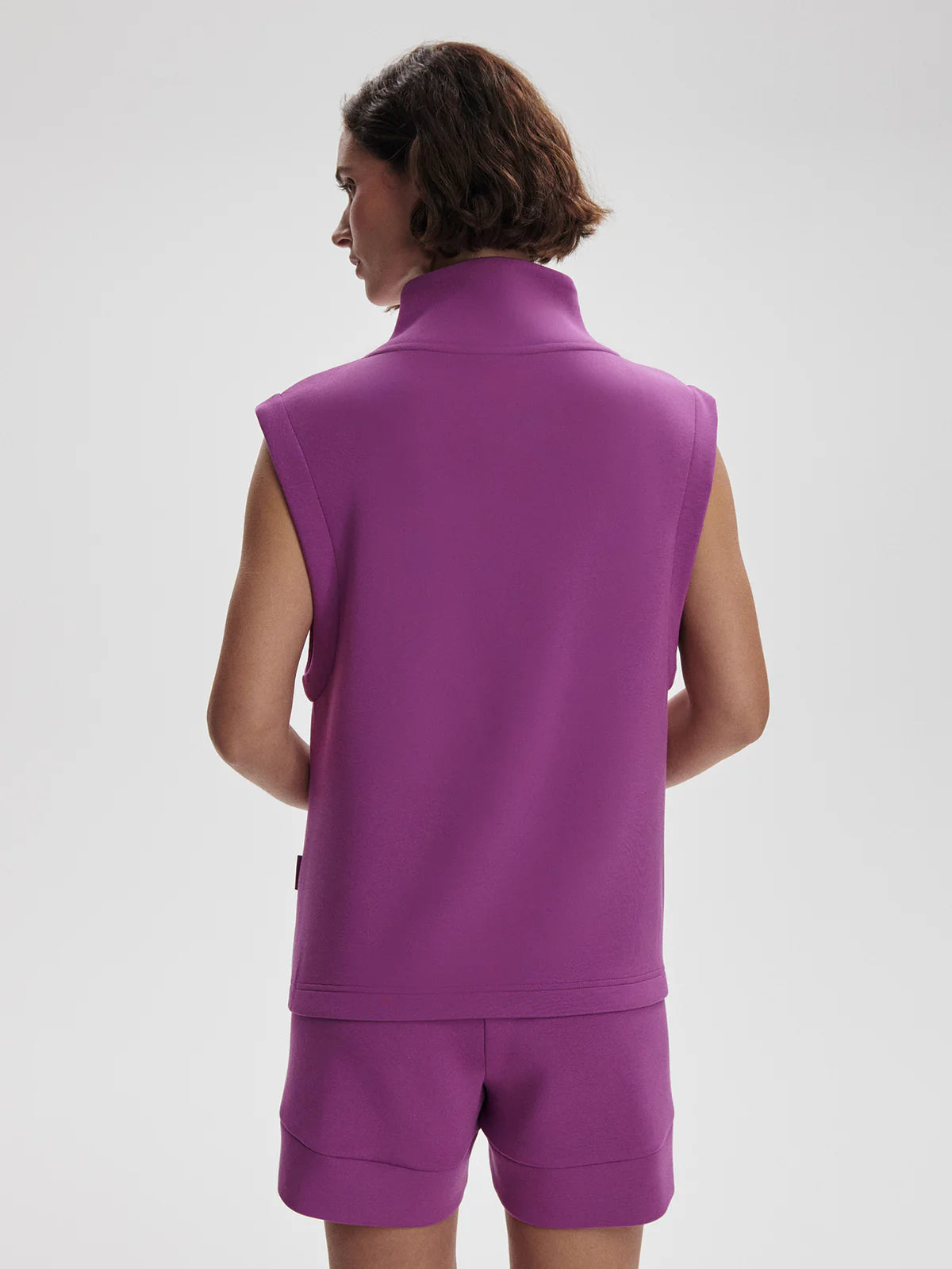 Débardeur OMEGA fushia à demi-zip