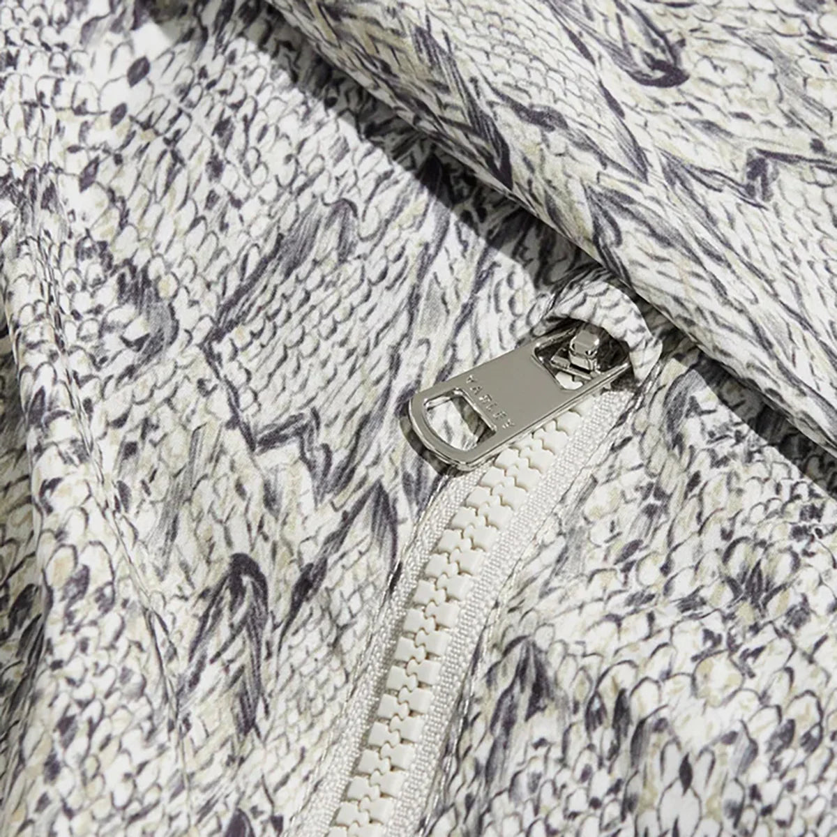 Veste TERRACE running – coupe-vent légère et imprimé “snake”