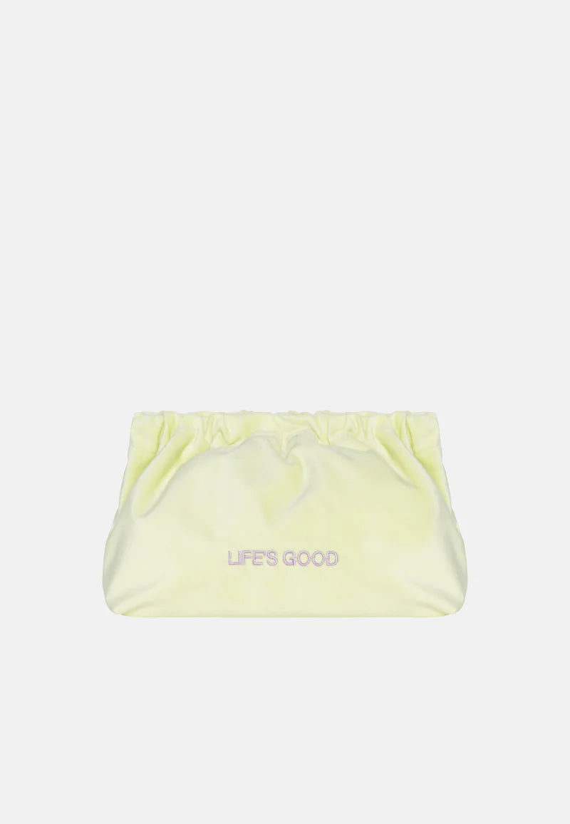 Pochette en velours jaune "Life’s Good"