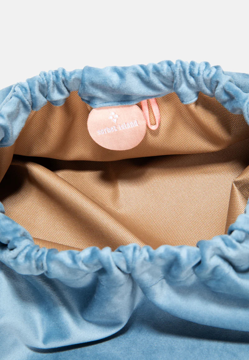 Pochette en velours bleu claire "good vibes"